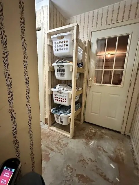 Laundry baskets on wooden shelves