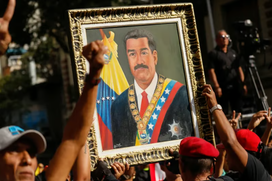 A portrait of the ousted Venezuelan President Nicolás Maduro at a demonstration in Caracas, January 2026 - Leonardo Fernandez Viloria / Reuters