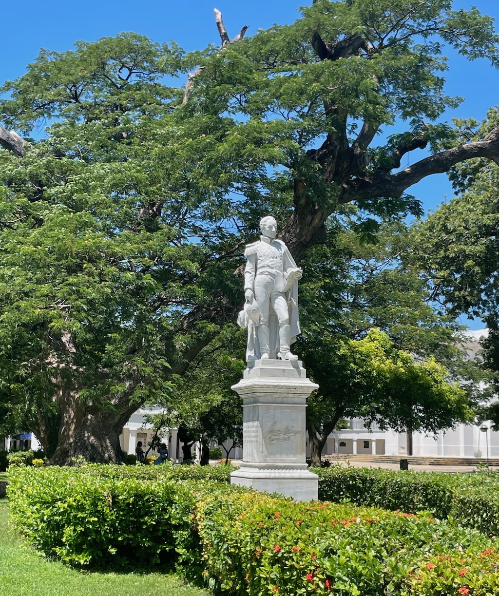 Stately Bolivar statue at the Quinta. Some of the huge trees date back to well before Bolívar's arrival.