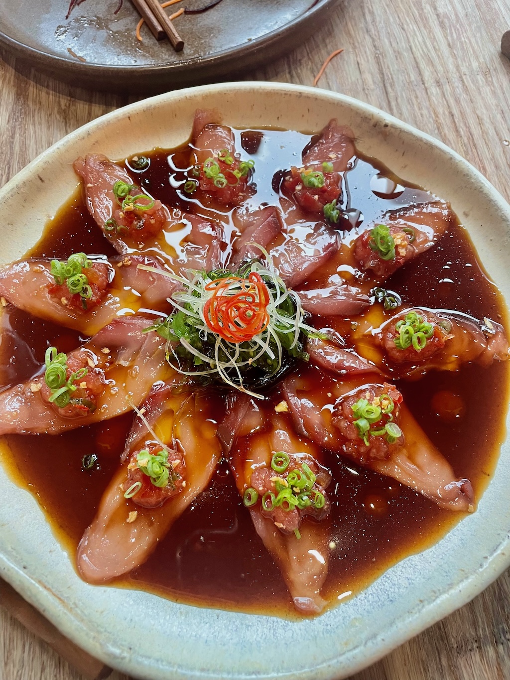 Beautifully presented tiradito (raw marinated fish) at Karai