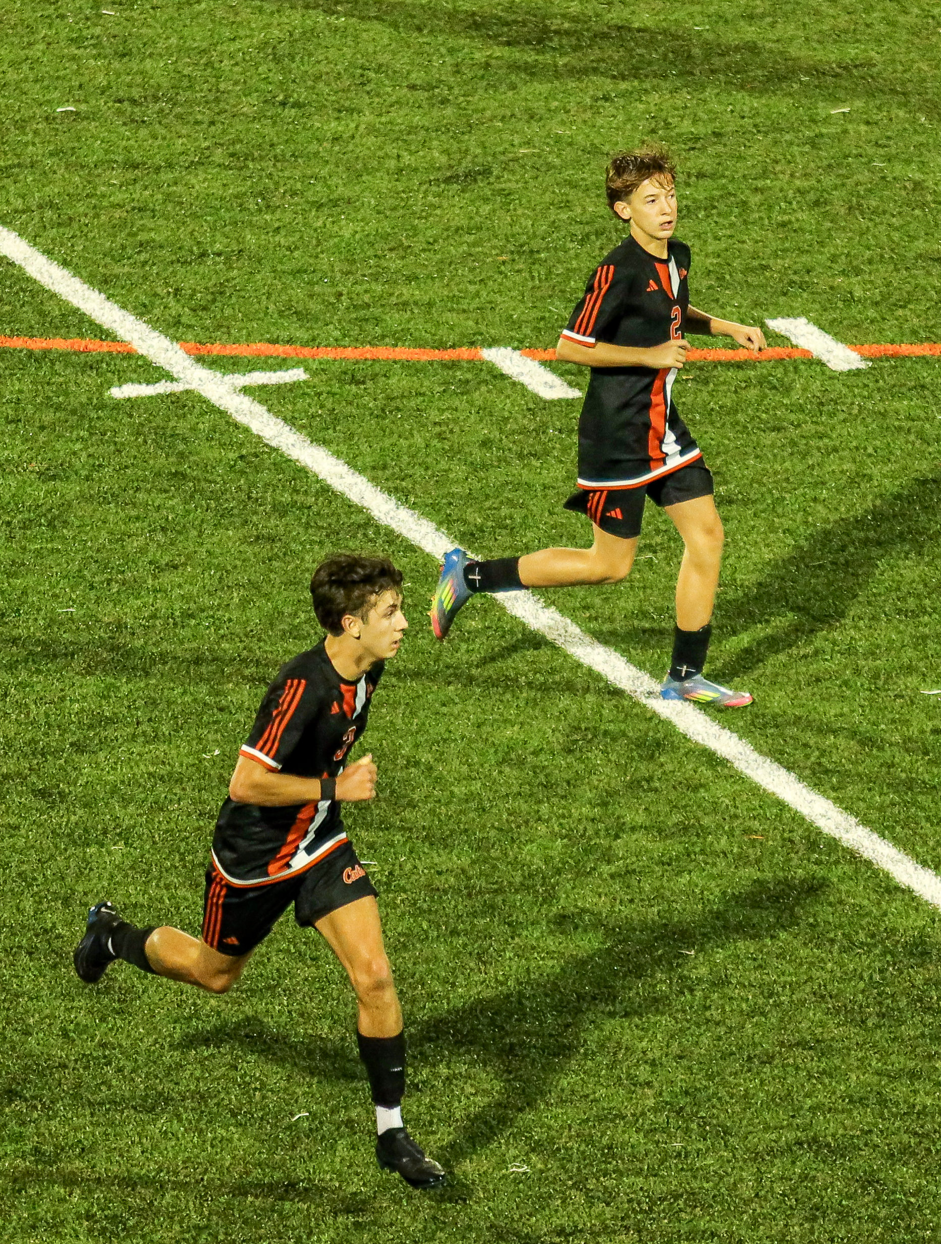 Brothers Jacob Stephenson number 3 and Ryan Stephenson number 2 playing together for Greater Latrobe