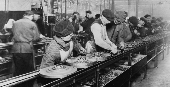 Factory workers hard at work in the early 1900's