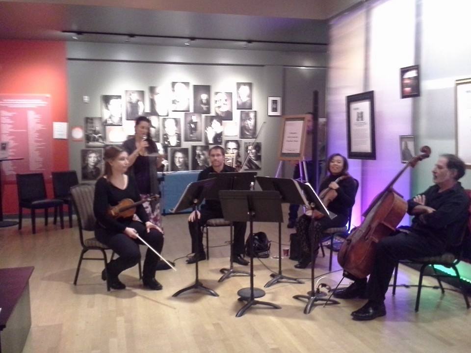 45th Parallel Chamber Ensemble prepares to play before a performance of DEAD MAN'S CELL PHONE. (2015)