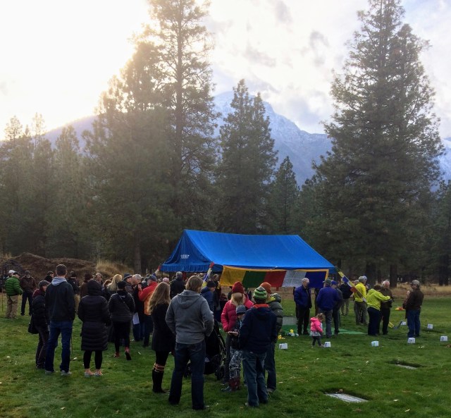 Friends and fans gather graveside at Fred Beckey's interment. 