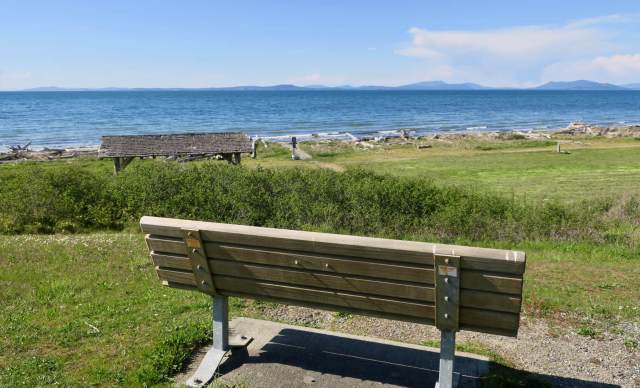 View of bench overlooking Puget Sound at Joseph Whidbey State Park