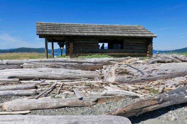 This log shelter near the tip of Spencer Spit is the second iteration of a guest cabin built here by the Spencer family in the 1910s. (Lauren Danner photo)