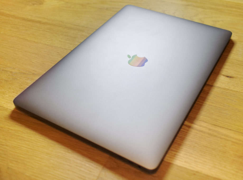 2018 i9 MacBook Pro with Apple's old rainbow tattoo