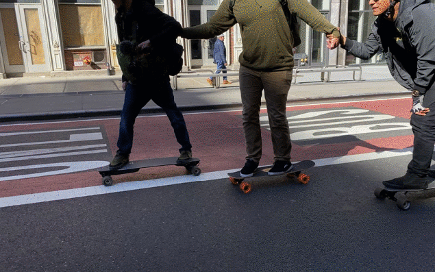 Animated gif of three people on skateboards