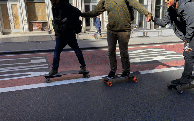 Animated gif of three people on skateboards