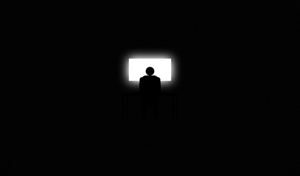 A lone shadowy figure in front of a bright computer screen. Illustration