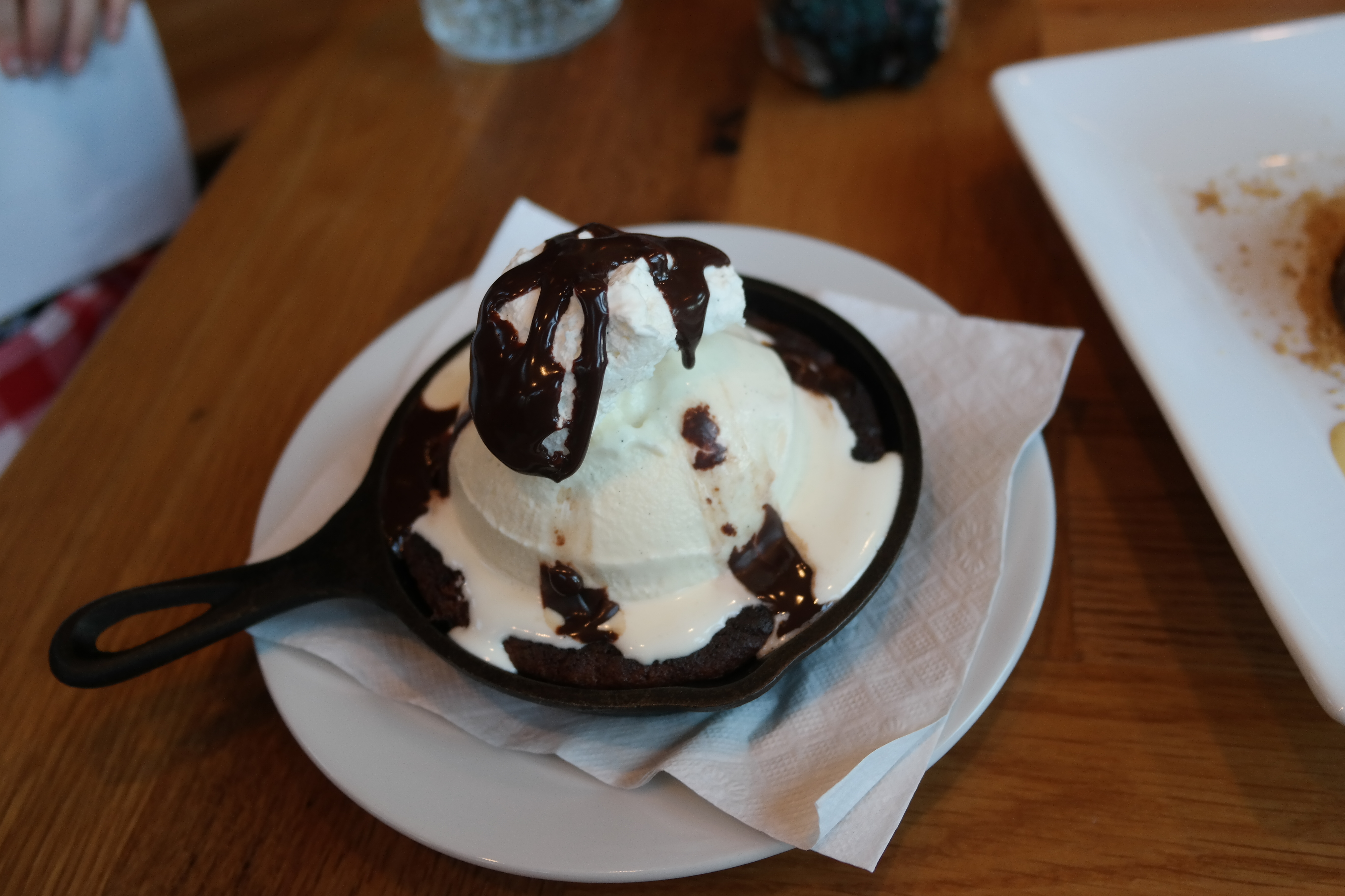 Skillet desserts are the best. This was a skillet cookie with ice cream and chocolate sauce.