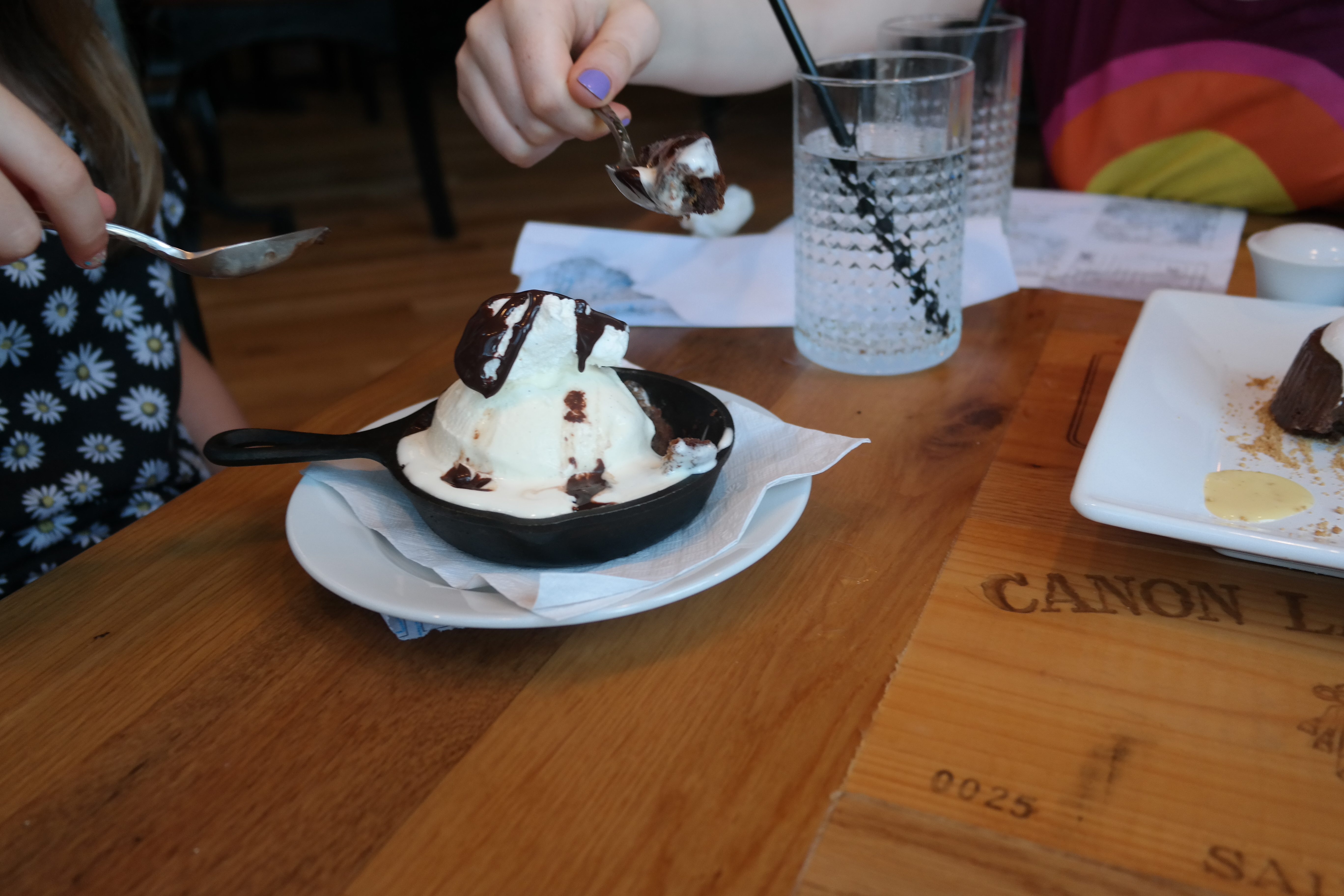 The girls digging in to their dessert. I believe we've had a request to go back for more already.