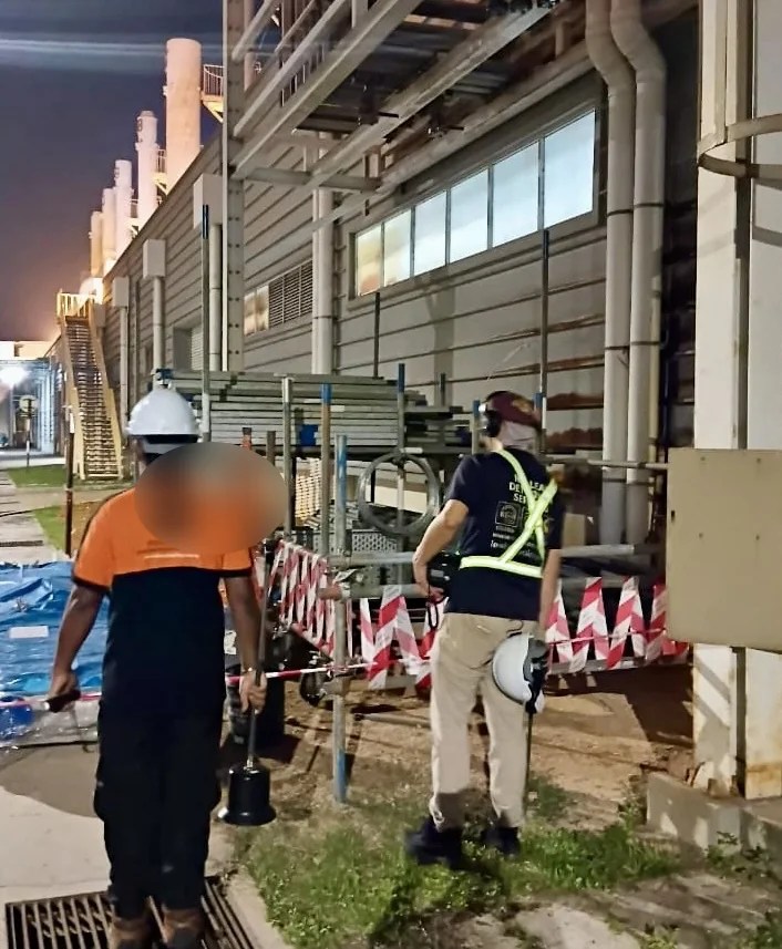 LeakPinpoint technician carrying out repeat acoustic comparison during a second night-time fire-main investigation session in Penang.