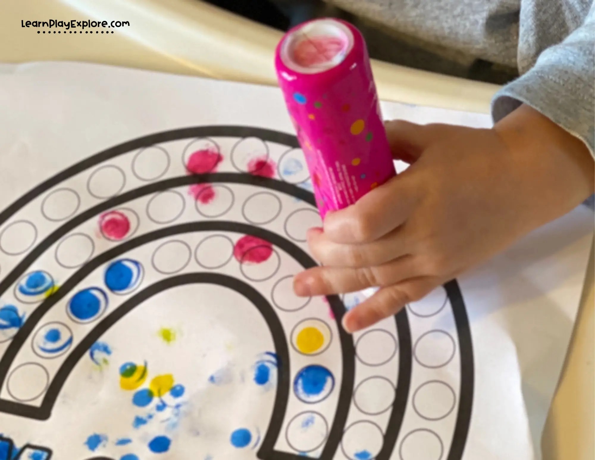 one year old using do a dot markers