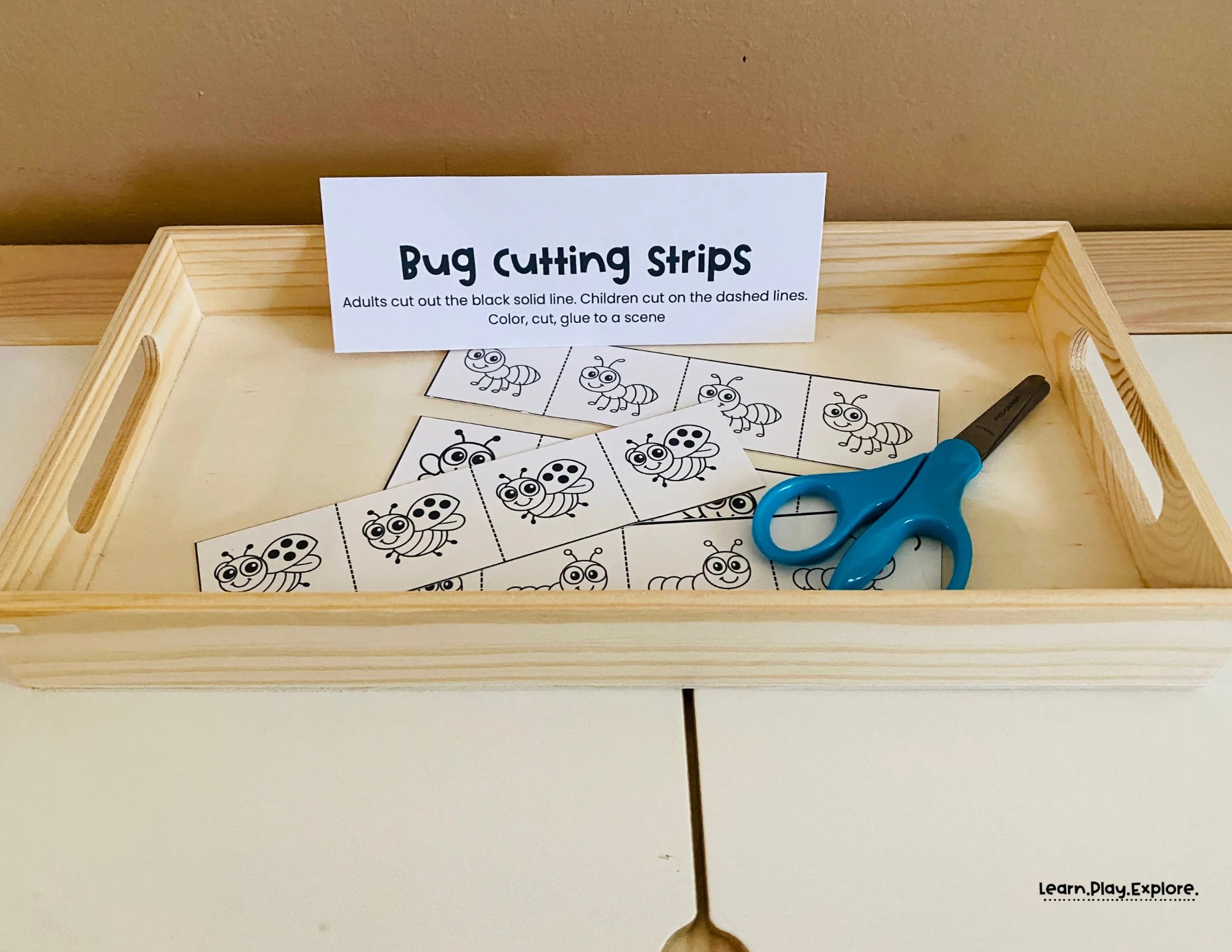 bug cutting strips fine motor tray