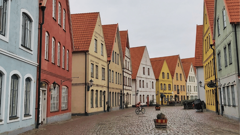 Colorful gabled houses and cobblestone streets in Jakriborg - one of the most charming towns and cities in Southern Sweden.