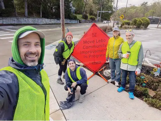 Move Lebo members volunteer at an organized sidewalk clean-up. The organization holds a variety of events like this one to improve walkability around Mt. Lebanon. (Photo provided)
