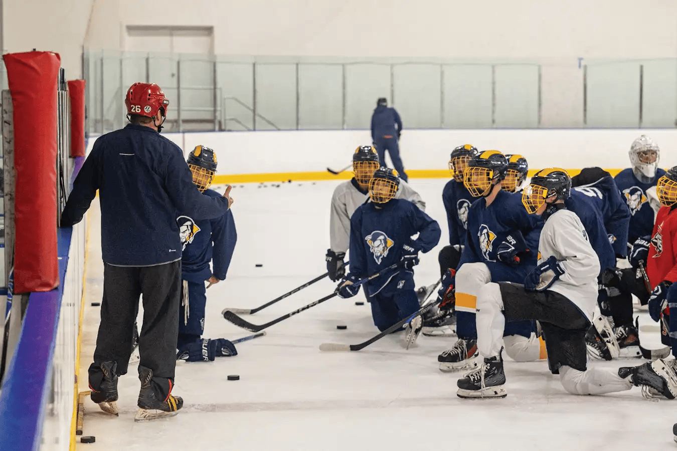 New Mt. Lebanon varsity hockey head coach Josh Werner leads the Blue Devils during a recent practice. Photo provided)