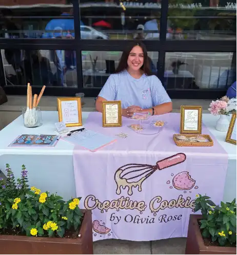 Olivia Rose Khalil showcases her Creative Cookies by Olivia Rose creations during a July 19 pop-up event outside De Fer Coffee & Tea. (Photos provided)