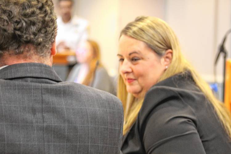 Nancy Clark, representing a group of neighbors appealing decisions that would allow the operation of Silver Scone Teas in the Village District I.