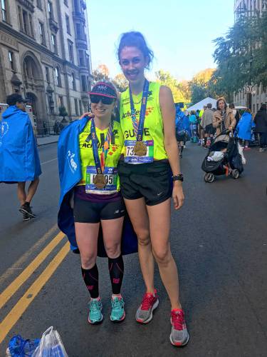 Peterborough native Ali Lynch, left, with  her guide and training partner, Jessie Rix.