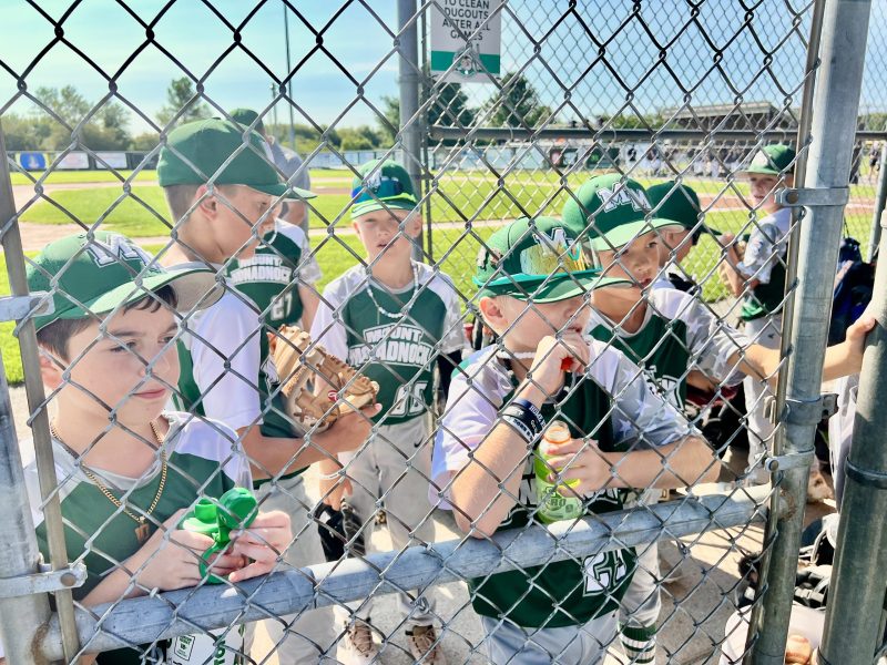 James St. John, Ty Somero, Barrett Traffie, Callan Brogan and Pierce Adams in the dugout.