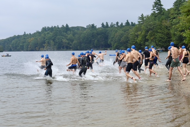 Racers running into Thorndike Pond to begin the Monadnock Full Throttle Triathlon Sept. 6