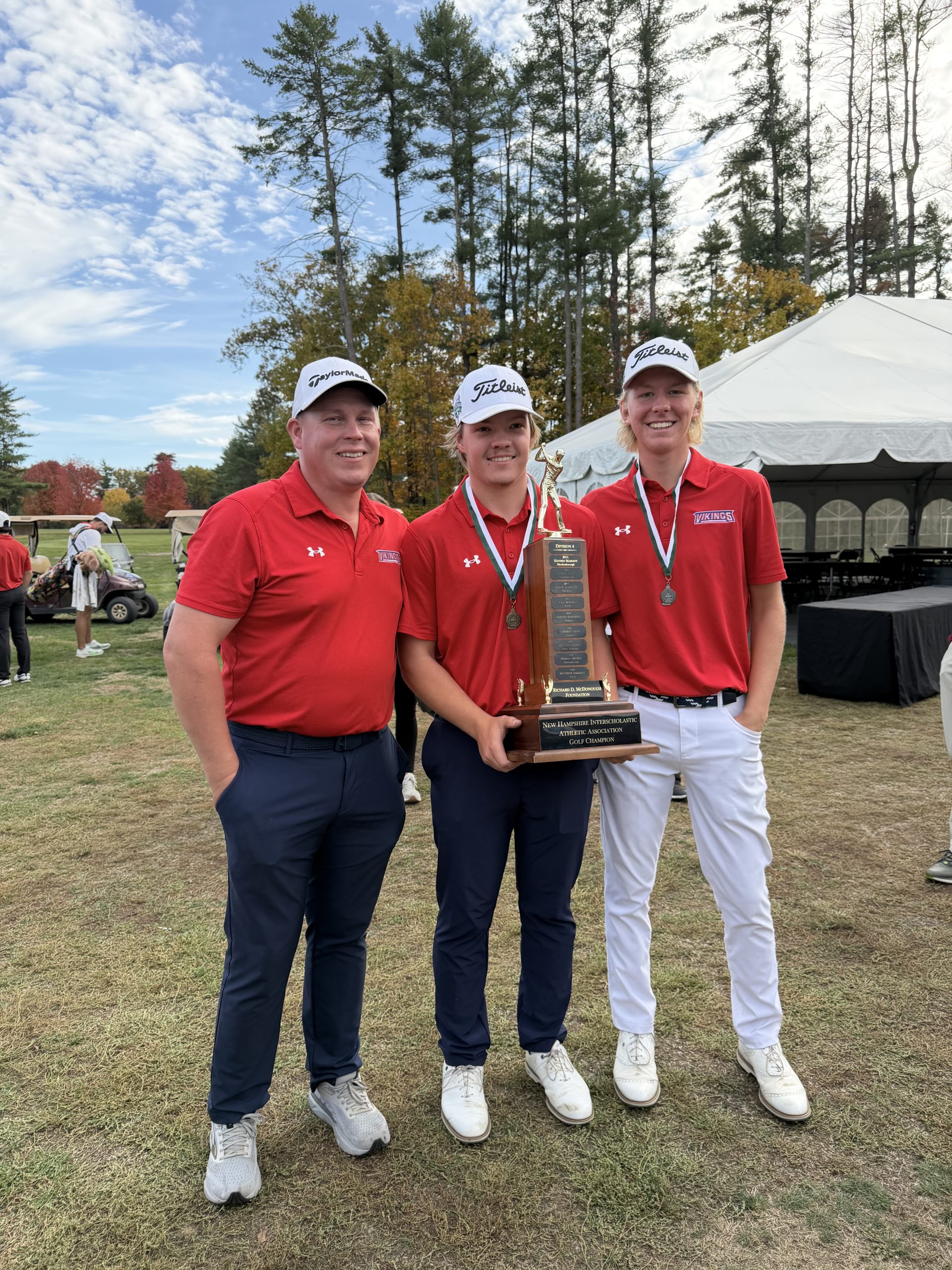 Mascenic Golf Coach Jeff Hakkala, left, with Colin Koukkari, left, the NH DIV IV Individual state champion and runner-up Brody Shaw. COURTESY