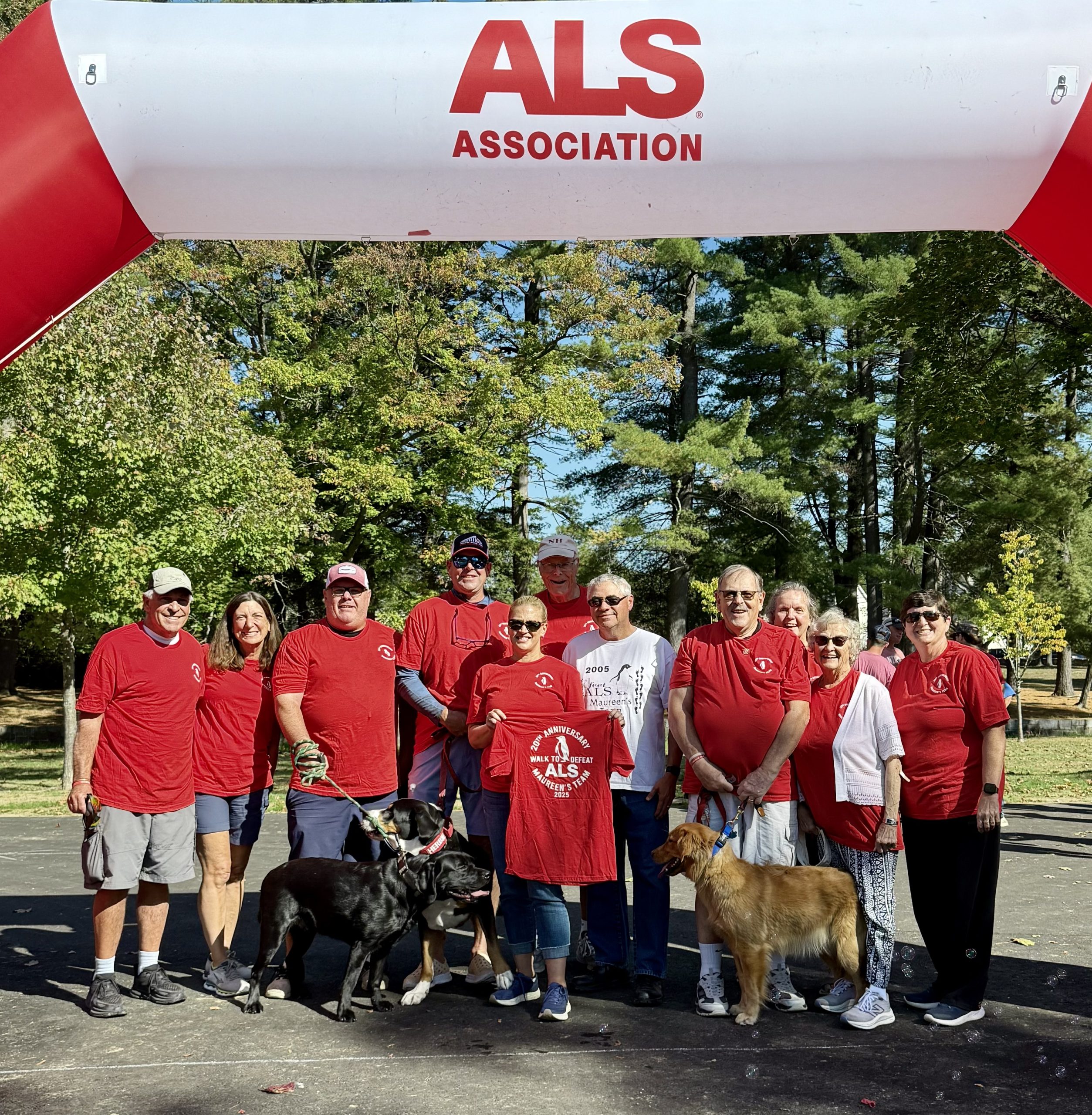 Members of Team Maureen (l to r): Greg Oliveira, Laura McPhie Oliveira, Jami Pompeo, Nick Thomas, Tami Risk, Chris Perkins, Wayne Thomas, Dee Thomas, Joy Boothby, Cindy McPhie Perkins and dogs Herbie, Sunflower and Ruger. Missing from photo: David Boothby.