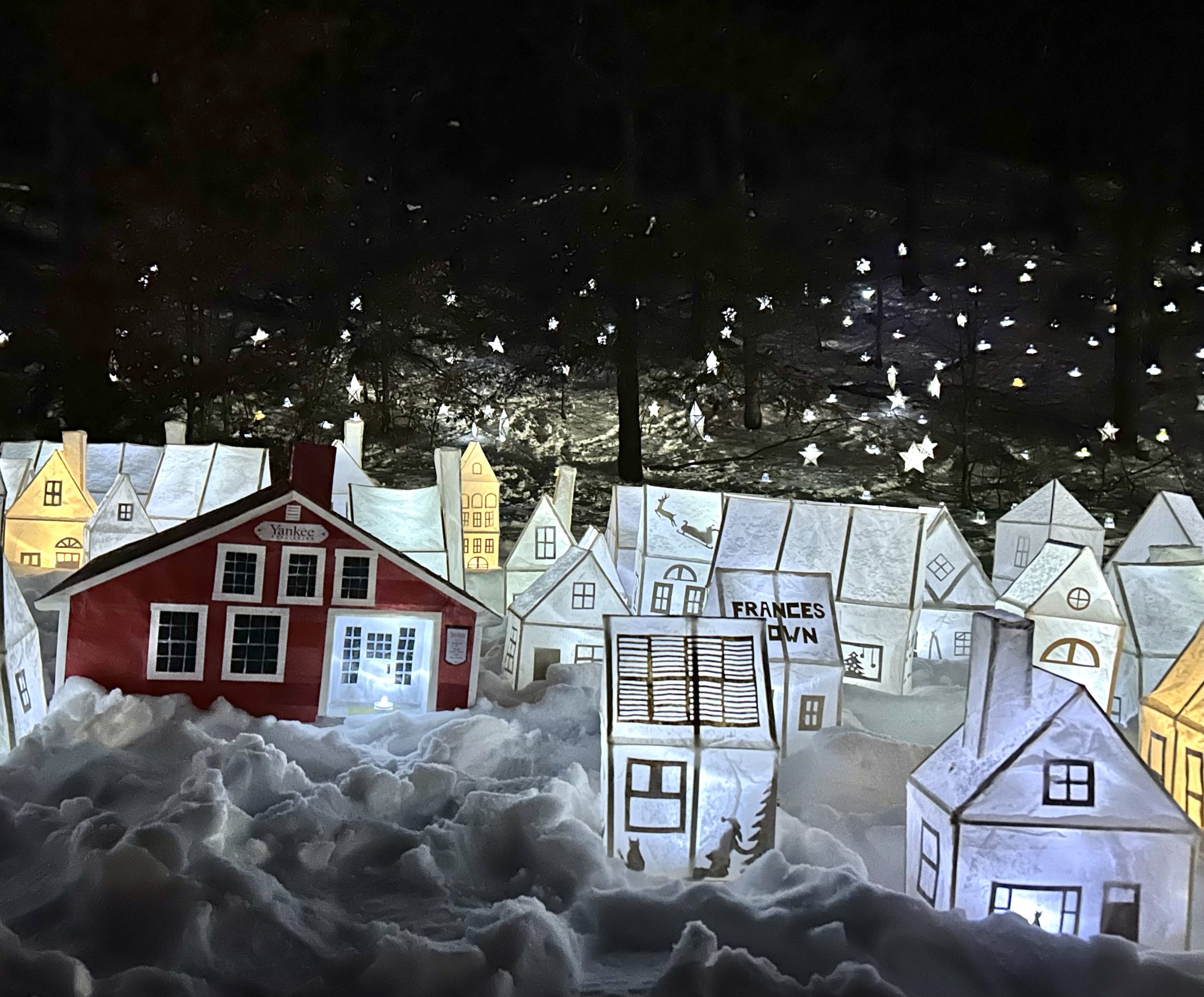 Illuminated village in Putnam Park in Peterborough, part of the 2025 Children and the Arts Lantern Festival.