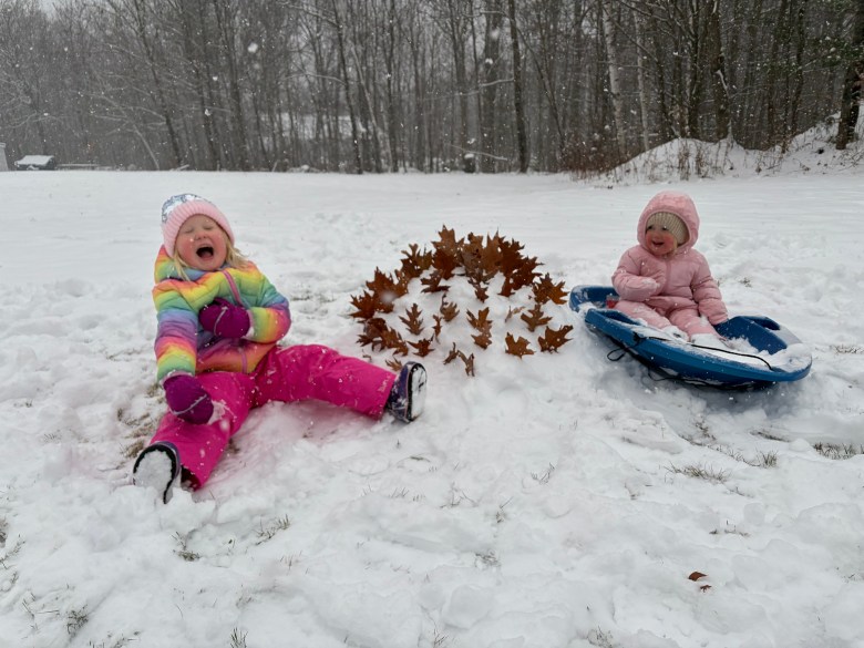 Ella and Ada Somero of New Ipswich playing with their “snow castle”. EMILY SOMERO / Courtesy
