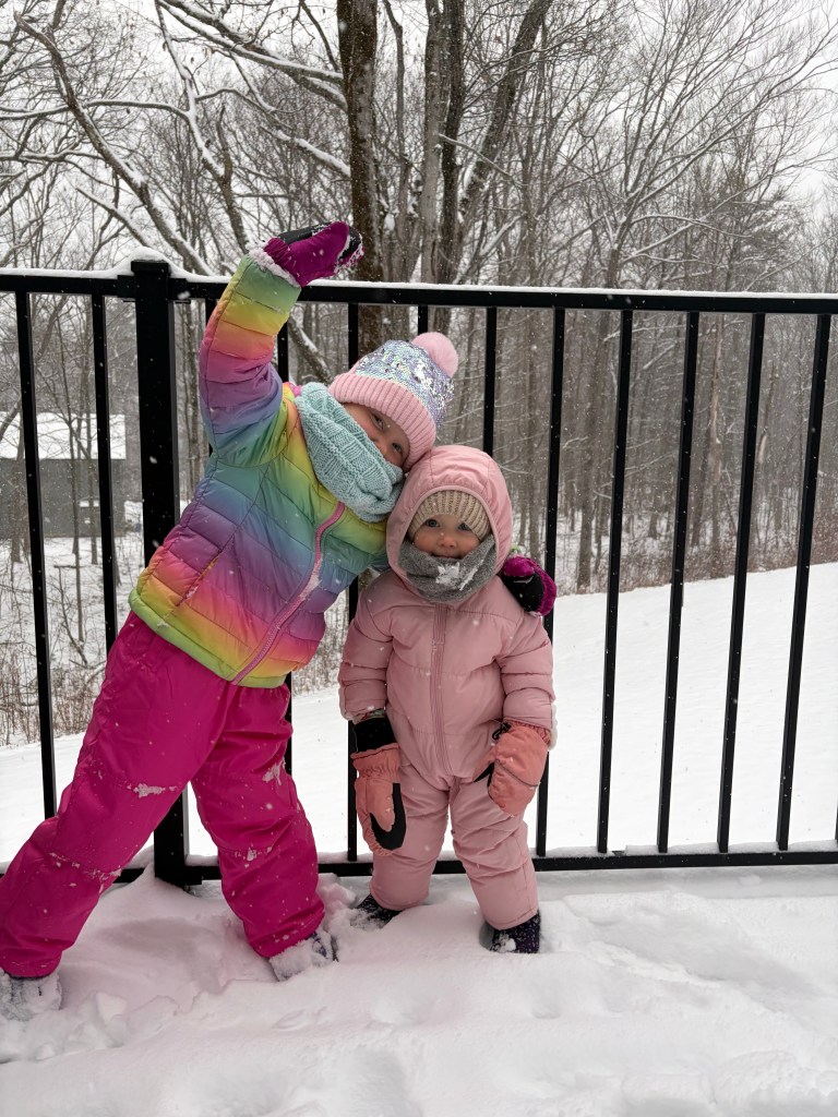Ella and Ada Somero of New Ipswich play in the snow. EMILY SOMERO / Courtesy