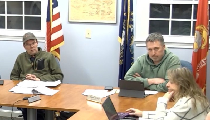 Select Board members Jason Somero and Shawn Talbot discuss the budget during Tuesday's budget hearing. ASHLEY SAARI / Ledger-Transcript