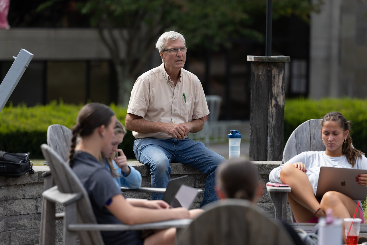 Tom Bennett teaches in the courtyard at Franklin Pierce University. COURTESY / Ledger-Transcript