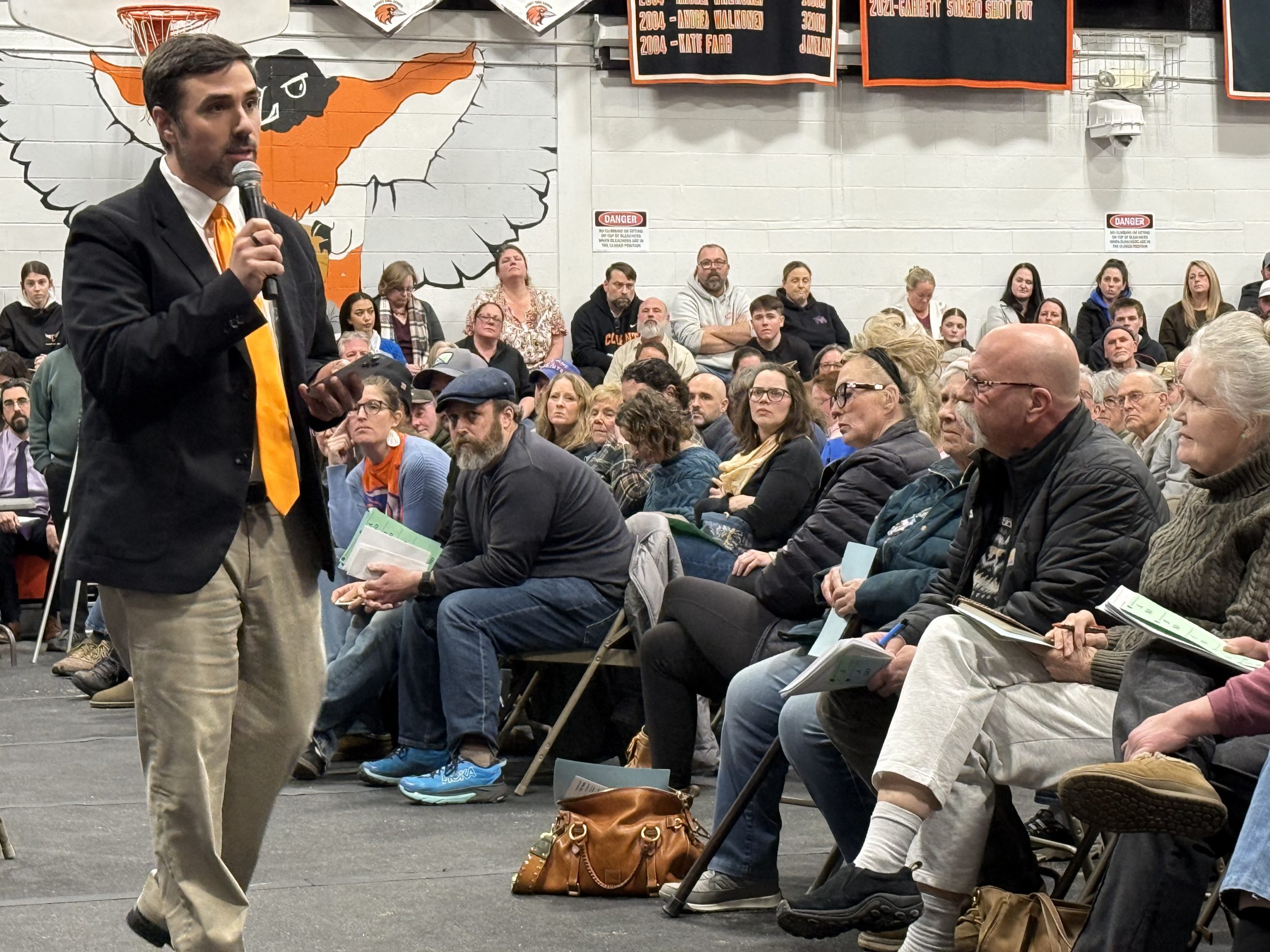 Conant Principal David Dustin speaks to the crowd about test scores and what the district is doing to improve. ASHLEY SAARI / Ledger-Transcript