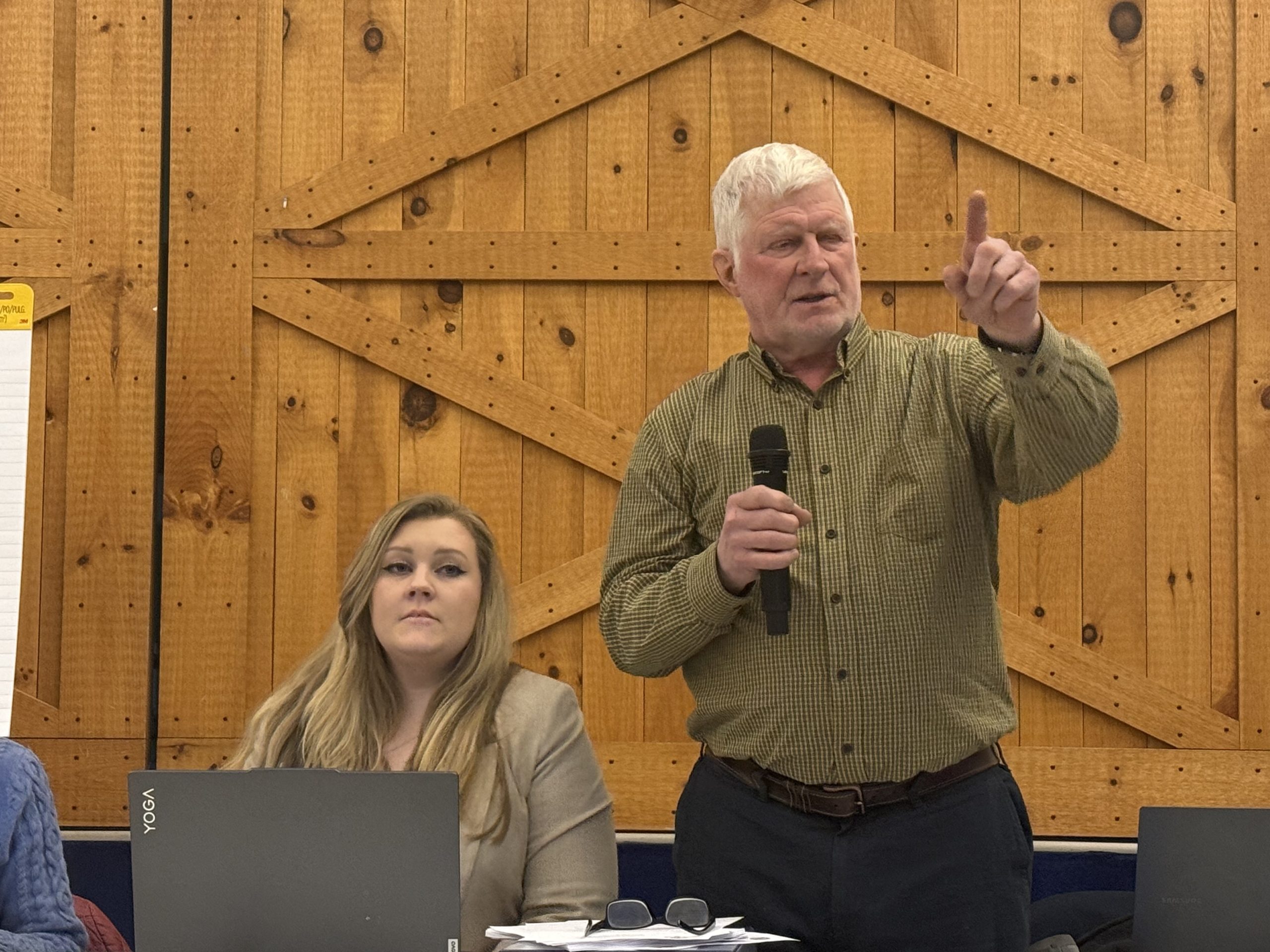 Planning Board Chair Dane Rota calls on residents to give testimony.