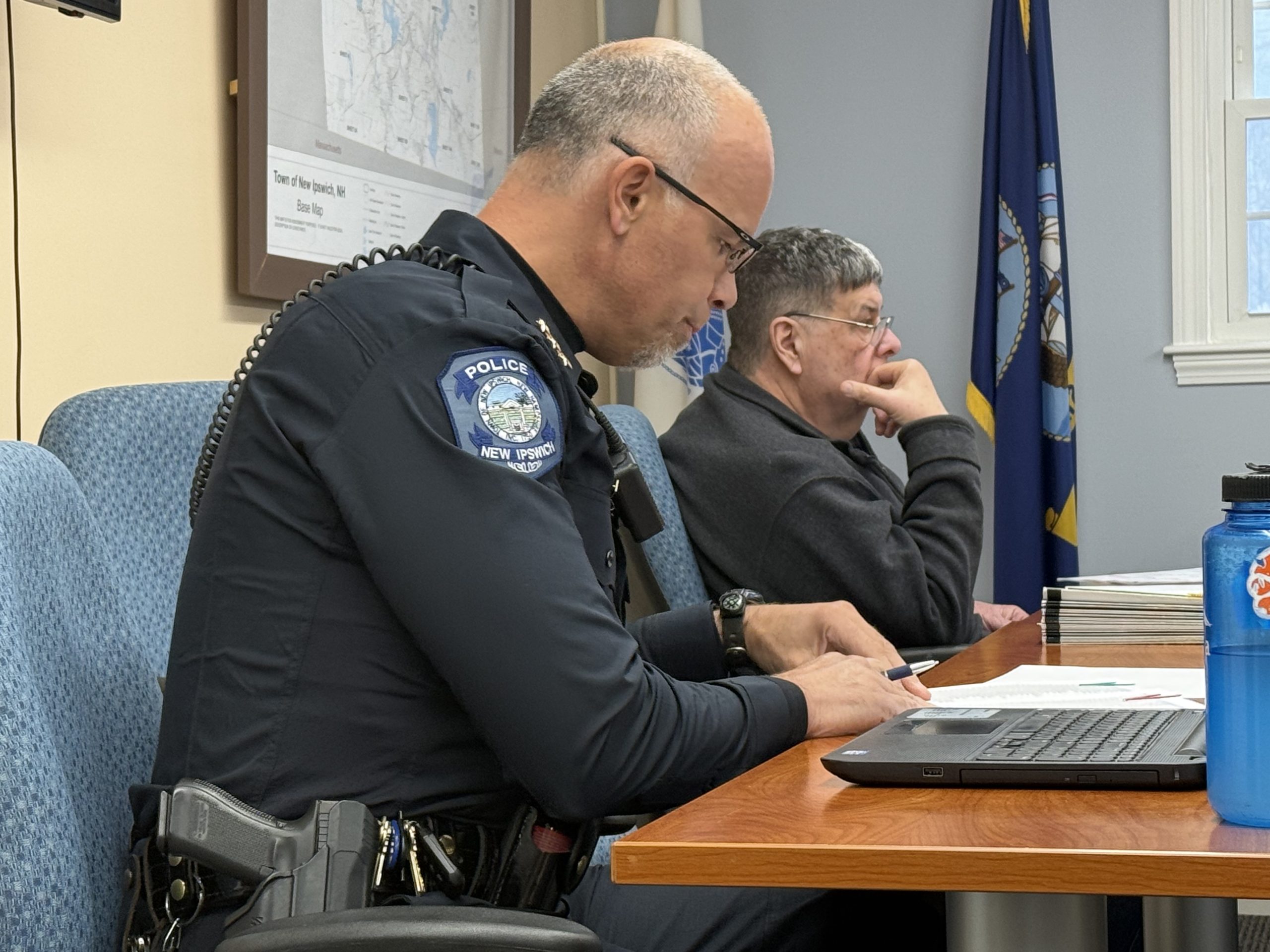 New Ipswich Police Chief Mike Abel and Selectman Lou Alvarez discuss wage increases under the default budget.