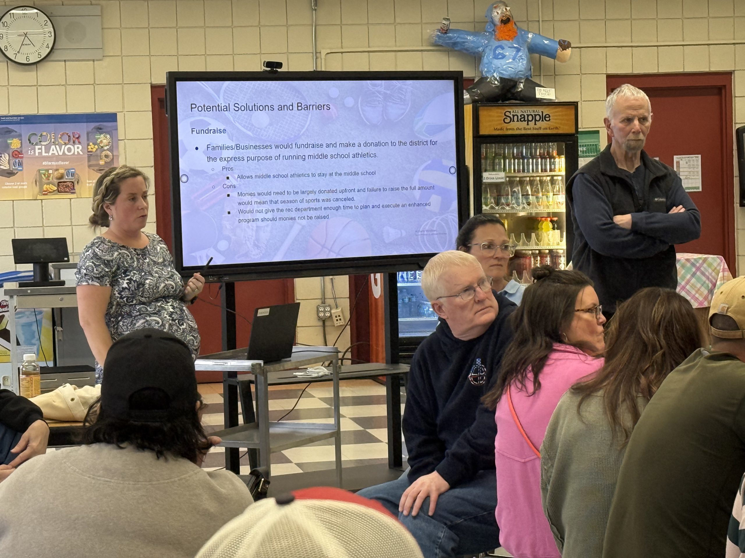 Superintendent Liz Pogorzelski and School Board member Mitch Gluck discuss option for next year's middle school sports.