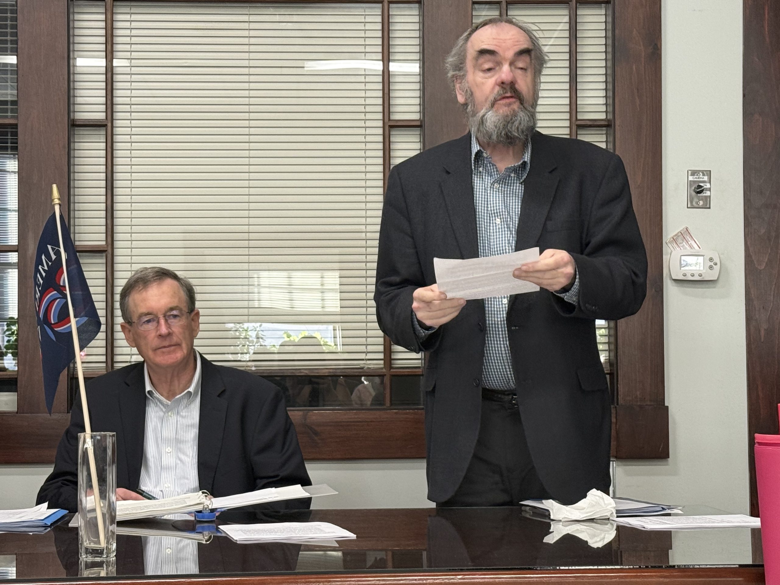 Moderator Bill Keefe listens as Select Board Chair Kermit Williams speaks to an article that would offer a tax exemption for new business construction, renovation or improvements.
