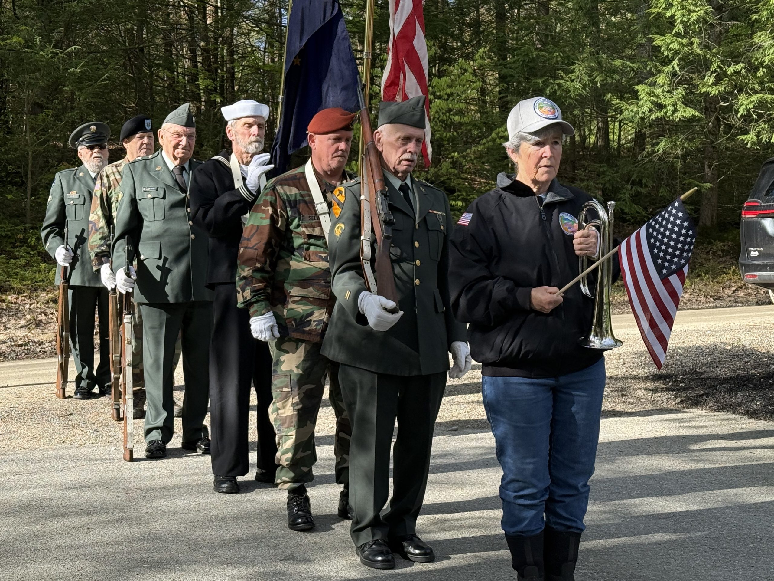 The Rindge Veterans' Association marches to pay respect to Col. Daniel Rand at his gravesite.