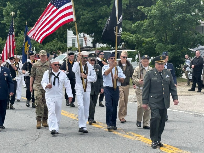 Veterans, led by parade Marshal David Quinn, march in Temple's Memorial Day parade on Sunday. 