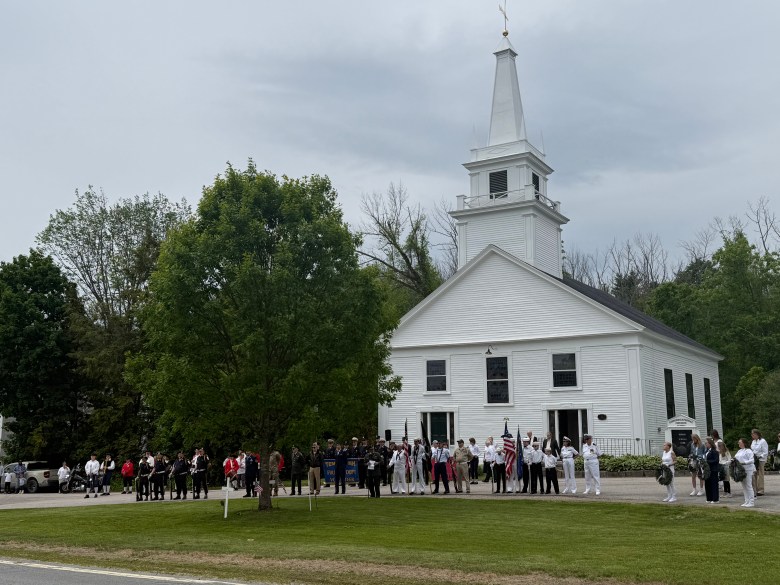 Marchers in Temple's Memorial Day parade line up in front of the town's Memorial Tree. 