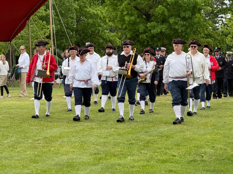 The Temple town band play and march in the parade. 