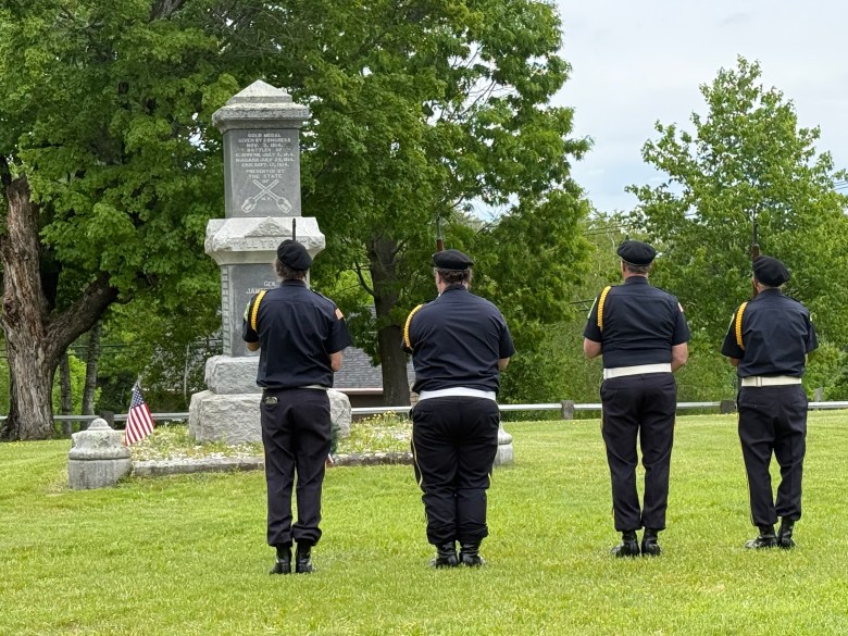The Greenville American Legion Post 13 rifle squad prepare to fire a salute in front of the war memorial honoring Gen. James Miller on the Temple common. 