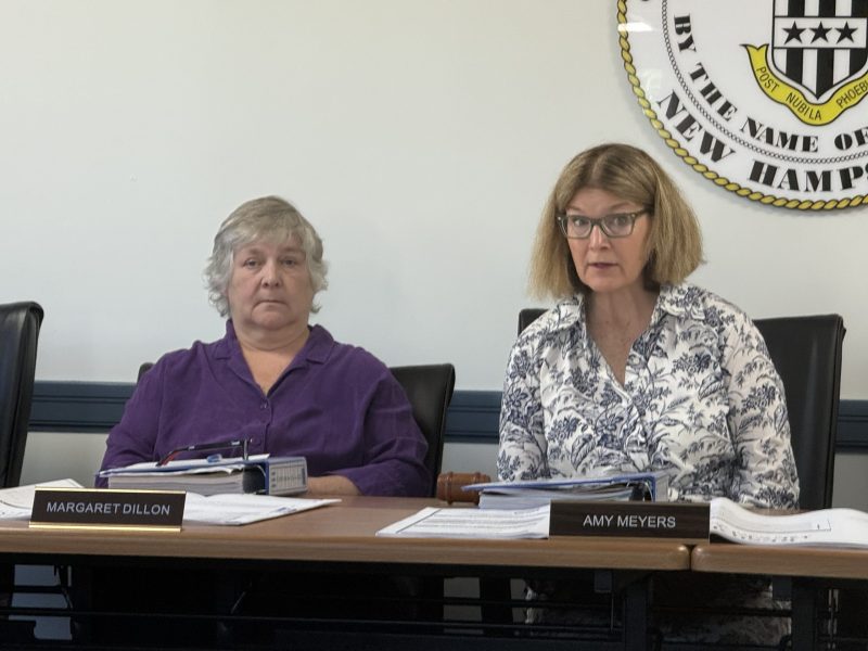 Planning Board members Margaret Dillon and Amy Meyer listen to proposed changes for the former St. Patrick's School development.