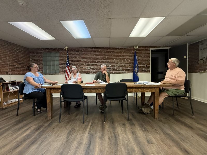 Town Administrator Tara Sousa, and Select Board members Katherin McNamara, Daniel Sadkowski, and Charles Buttrick discuss a proposed tax relief application.