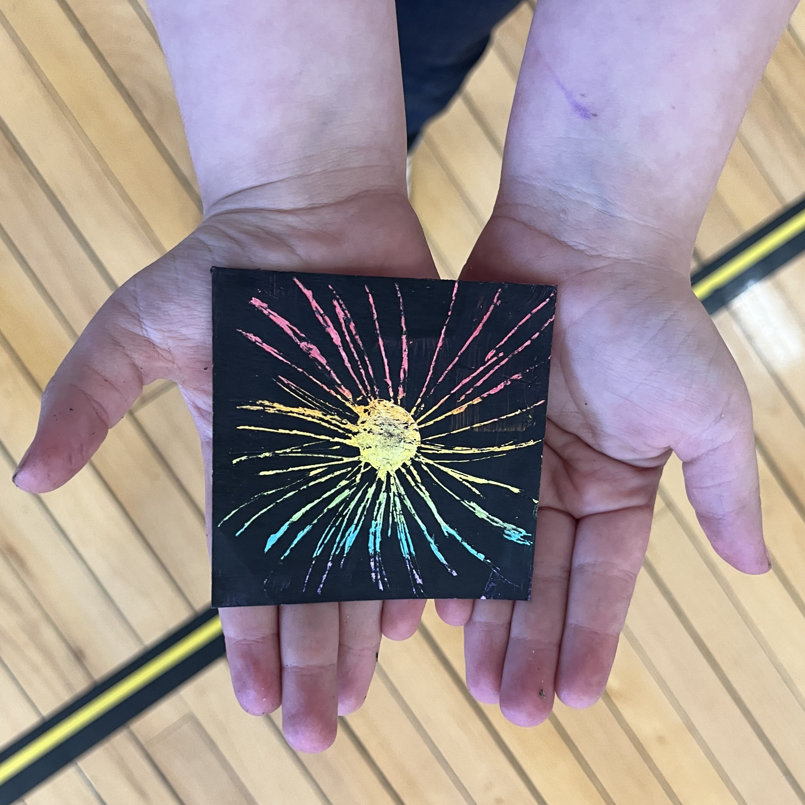 Fireworks created on scratchboards by Jaffrey Grade School students.