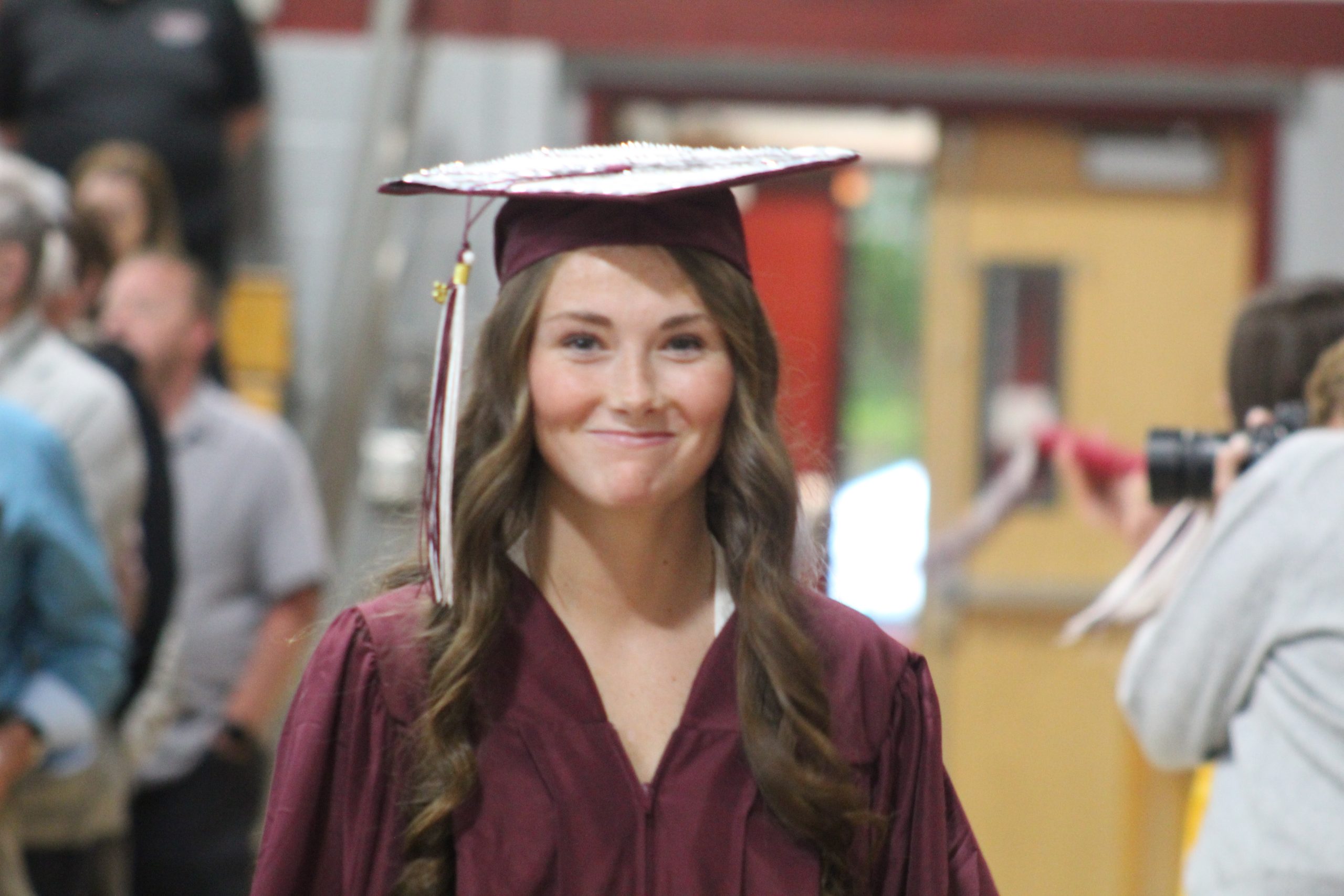 Cailin Tetreault marches to the graduation stage.