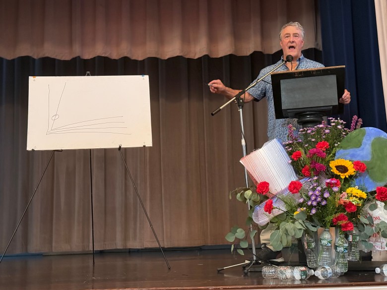 Duncan Watson speaks at the Amos Fortune Forum on Friday.
