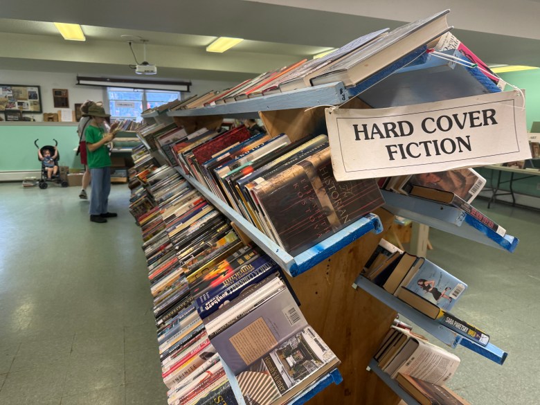 Readers browse the book sale.